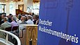 Musikinstrumentenpreis Hinweisschild